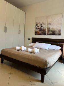 Postel nebo postele na pokoji v ubytování Il Nido dei Mondagli