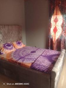 Postel nebo postele na pokoji v ubytování Cutting Edge Guest House