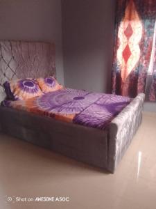 Postel nebo postele na pokoji v ubytování Cutting Edge Guest House