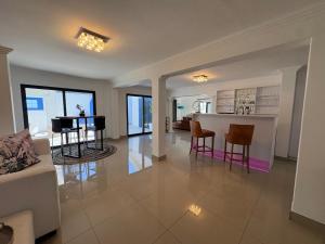 Posezení v ubytování The Lighthouse - Beachfront