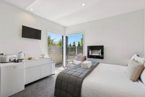 En eller flere senge i et værelse på A Room on the Peninsula