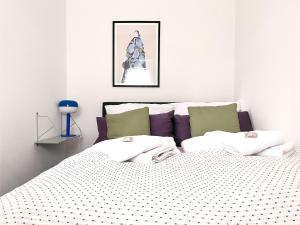 Postel nebo postele na pokoji v ubytování Schönes PENTHOUSE Dümmer See - Lembruch + 23 fotografií