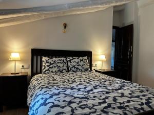 Postel nebo postele na pokoji v ubytování Casa Fuente Rivera