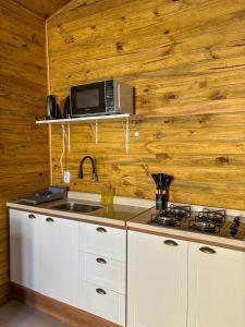 Køkken eller tekøkken på Chalé para casais! Completo e perto de tudo!