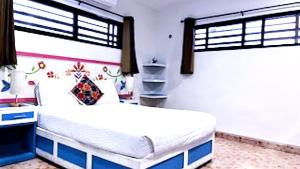 Ένα ή περισσότερα κρεβάτια σε δωμάτιο στο 1 Habitacion sencilla con baño propio