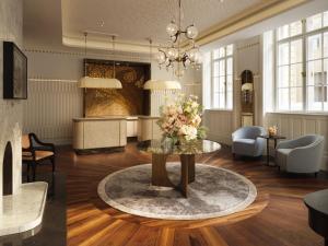 TV a/nebo společenská místnost v ubytování Mandarin Oriental, Vienna