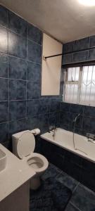 Koupelna v ubytování Sand & Sea Holiday Accommodation