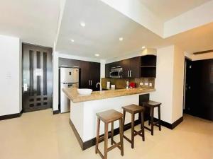 Køkken eller tekøkken på Aldea Thai Downtown Oceanview Residences + 79 billeder