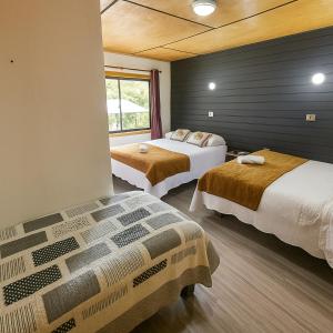 Ένα ή περισσότερα κρεβάτια σε δωμάτιο στο Residencial del Maule