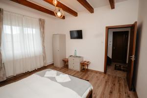 Postel nebo postele na pokoji v ubytování Cabana Iriss