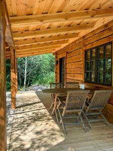 Φωτογραφία από το άλμπουμ του Authentic Log Cabin In Forest Near Ejstrupholm σε Ejstrup
