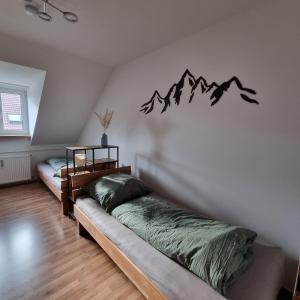 Postel nebo postele na pokoji v ubytování Donau & Berg Auszeit