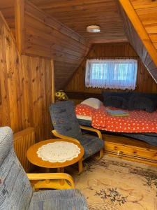 Posezení v ubytování Magiczny Dom nad Bugiem