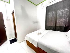 Fotografie z fotogalerie ubytování Homestay Bajet MokAji v destinaci Kuala Terengganu