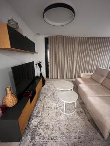 TV/trung tâm giải trí tại Kristiansand Apartament