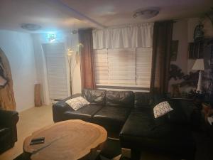 Posezení v ubytování Fiskecamp Rusksele