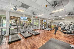 a gym with treadmills and elliptical machines at Full Duplex on Longboat Key, Walk to the Gulf + Cedars East Club Access in Longboat Key