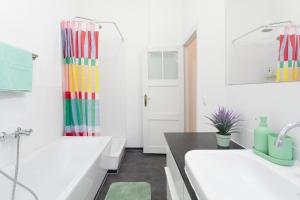 Koupelna v ubytování Villa Falkensee - Berlin West Design Boutique Apartments Ferienwohnung + 21 fotografií