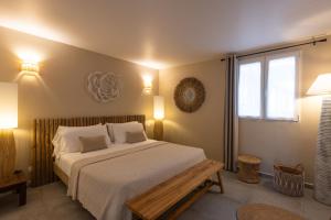 Ένα ή περισσότερα κρεβάτια σε δωμάτιο στο Orient Bay, Paolina Beach, sur le plage, Grand 2 chambres +54 φωτογραφίες