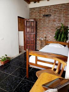 Postel nebo postele na pokoji v ubytování Casa Emanuel en Montañita