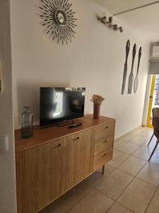 TV a/nebo společenská místnost v ubytování A Minha Casa na Praia da Rocha