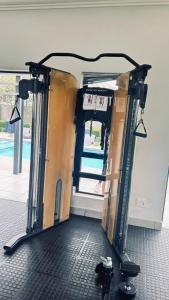 an open door to a pool in a building at Luxury Fourways Apartment, Pool, Gym and 24hr Security - Ventura Estate in Sandton