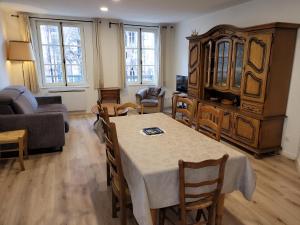 Posezení v ubytování Les appartements Place de la Cathédrale