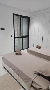 Ένα ή περισσότερα κρεβάτια σε δωμάτιο στο Appartement Theline