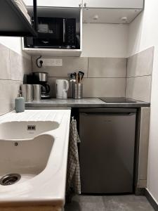 Η κουζίνα ή μικρή κουζίνα στο Zen & Yoga - Downtown - Free Parking - 2 beds +18 φωτογραφίες