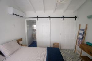 Ένα ή περισσότερα κρεβάτια σε δωμάτιο στο Uncle Bobs Reef