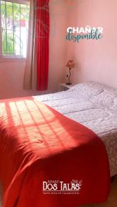 Postel nebo postele na pokoji v ubytování Calamuchita Apart Dos Talas