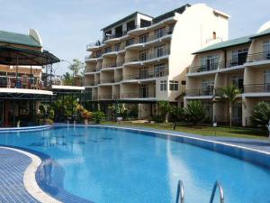 a large swimming pool in front of a building at Ryan's Bay Hotel in Mwanza