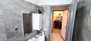 Koupelna v ubytování Executive Stay Lago Maggiore + 11 fotografií