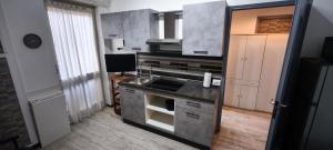 Kuchyň nebo kuchyňský kout v ubytování Executive Stay Lago Maggiore