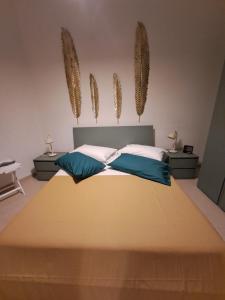 Ένα ή περισσότερα κρεβάτια σε δωμάτιο στο ORTIGIA LUXURIs DOMUs +7 φωτογραφίες