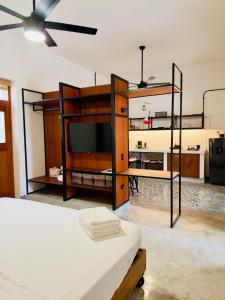 Postel nebo postele na pokoji v ubytování Casa Lluavi - Caliope