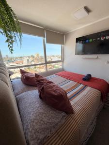 Ένα ή περισσότερα κρεβάτια σε δωμάτιο στο Departamento rancagua centro nuevo