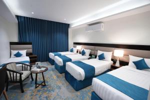 Voodi või voodid majutusasutuse Afaq Al Masi Hotel toas