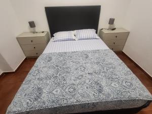 En eller flere senge i et værelse på OsTorres + 5 billeder