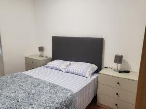 En eller flere senge i et værelse på OsTorres