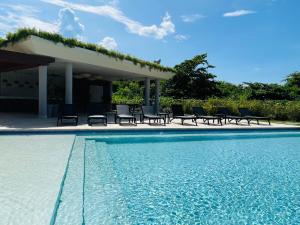 Imagen de la galería de Marien Residences 221 Garden & Partial Ocean View Condo, en Puerto Plata 34 fotos más