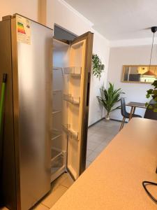 Η κουζίνα ή μικρή κουζίνα στο Nuevo - moderno - aire acondicionado- parking privado - céntrico