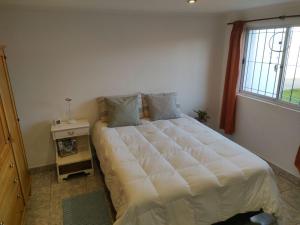 Postel nebo postele na pokoji v ubytování Casa Piateda Promo finde largo