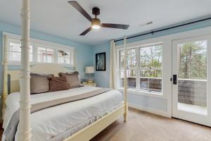 Postel nebo postele na pokoji v ubytování wave watchers