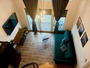 TV a/nebo společenská místnost v ubytování Vista - Domek Wakacyjny w Górach Sowich + 35 fotografií