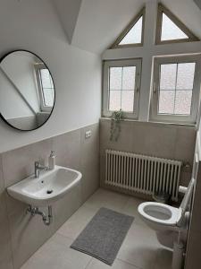 Ванная комната в Zweistöckige Wohnung im weissen Lamm