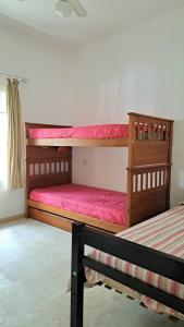 Postel nebo postele na pokoji v ubytování Casa Narnia