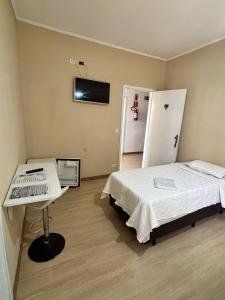 Ένα ή περισσότερα κρεβάτια σε δωμάτιο στο Exito +11 φωτογραφίες