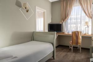 TV a/nebo společenská místnost v ubytování Hotel Campo Marzio