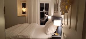 Postel nebo postele na pokoji v ubytování Ferienwohnung Coproyshof am See in Wesel am Niederrhein 5 Sterne DTV-Klassifizierung 6 Personen + 73 fotografií